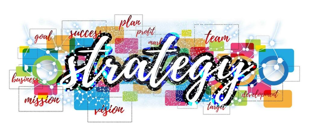 "Strategy" text overlay, over rectangles labeled "goal," "business," "mission," "success," "vision," "plan," "profit," "team," "target," and "development" - WebGrit